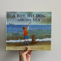 A BOY, HIS DOG AND THE SEA