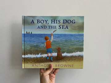 A BOY, HIS DOG AND THE SEA