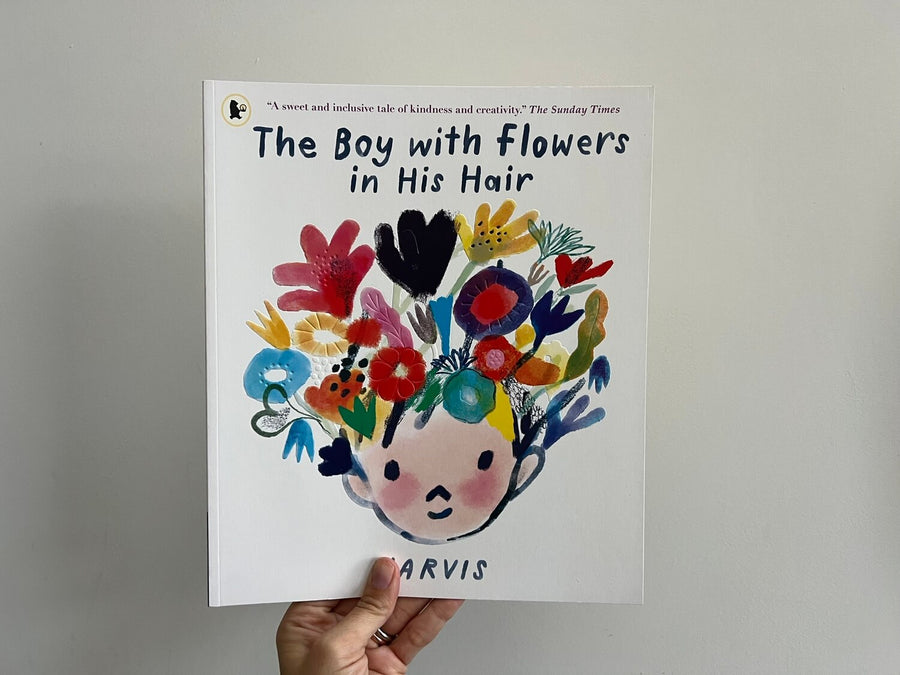THE BOY WITH FLOWERS IN HIS HAIR